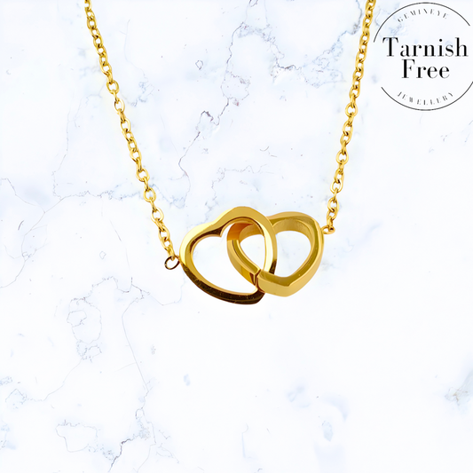 Gold bracelets for women, gold earrings for women, gold bangle, silver bracelet for women, silver, earrings for women, silver rings for women, silver necklace women, A Gemineye Jewellery gold double linked heart pendant necklace, perfect for women looking for a touch of elegance.