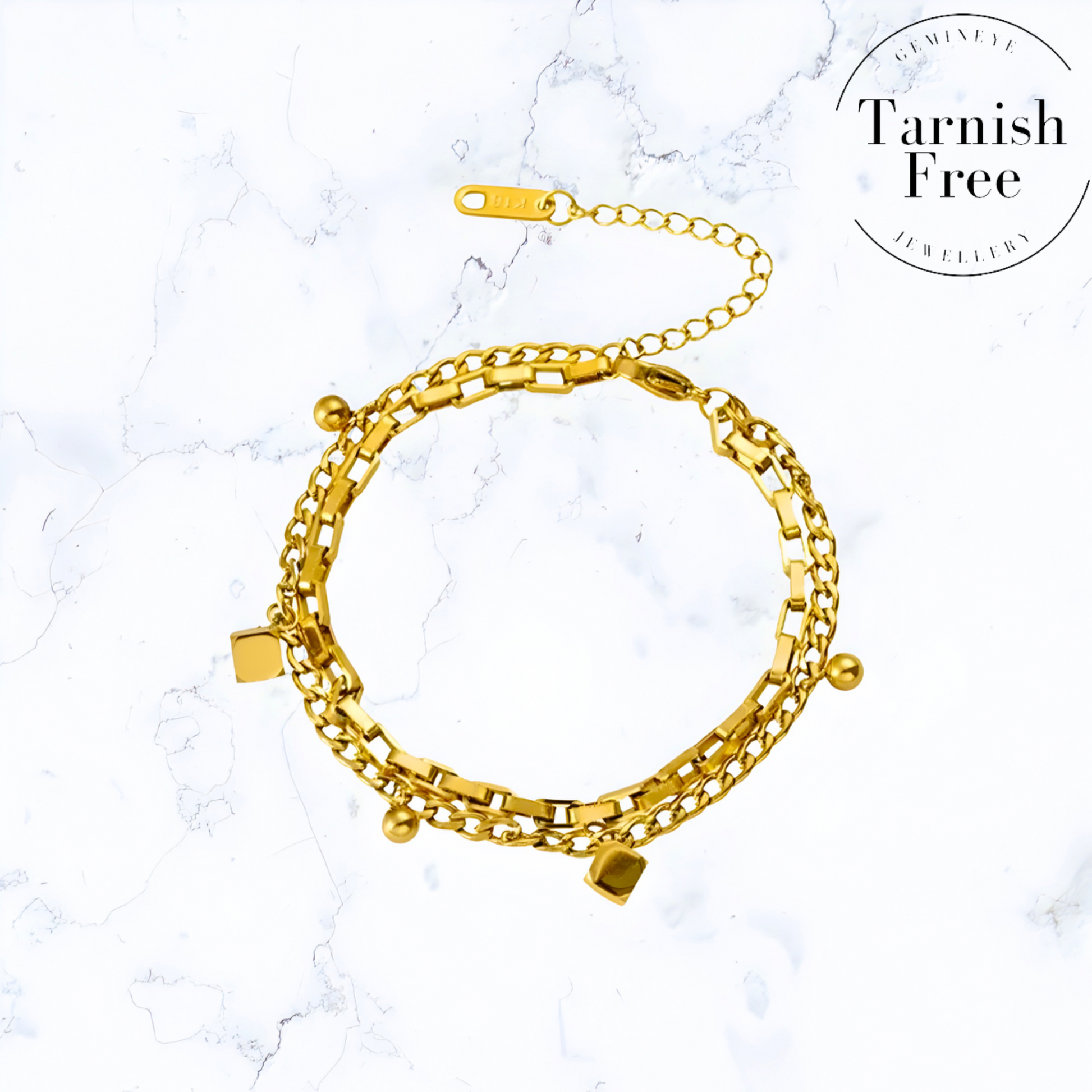 Gold bracelets for women, gold earrings for women, gold bangle, silver bracelet for women, silver, earrings for women, silver rings for women, silver necklace women, A Gemineye Jewellery Gold Duo Chain Bracelet with the words "tarnish free", perfect for women.